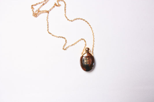 Lot 128: Vintage Givenchy Pendant