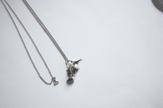 Lot 136: Jug Pendant